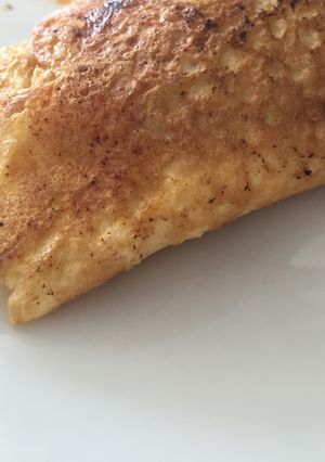 Una foto de Tortilla de tomate frito con queso 