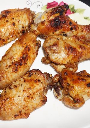 Una foto de Alitas de pollo al broiler