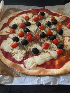 Une photo de Pizza margerita