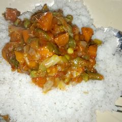 A picture of Dambun shinkafa + Vegetable Soup.