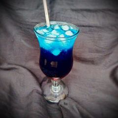 A picture of Layered Blue Night Mocktail.