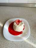 Panna cotta de vainilla con coulis de frambuesas