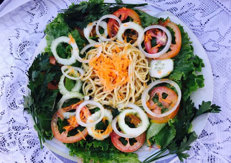 Low fat pasta on green salad
