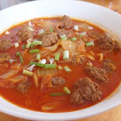 A picture of Kimchi Meat Ball Soup.