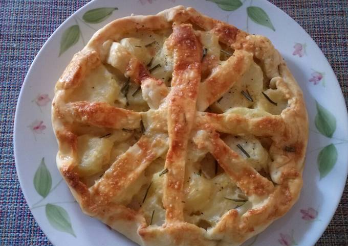 Rustic potato, rosemary and Parmesan pie