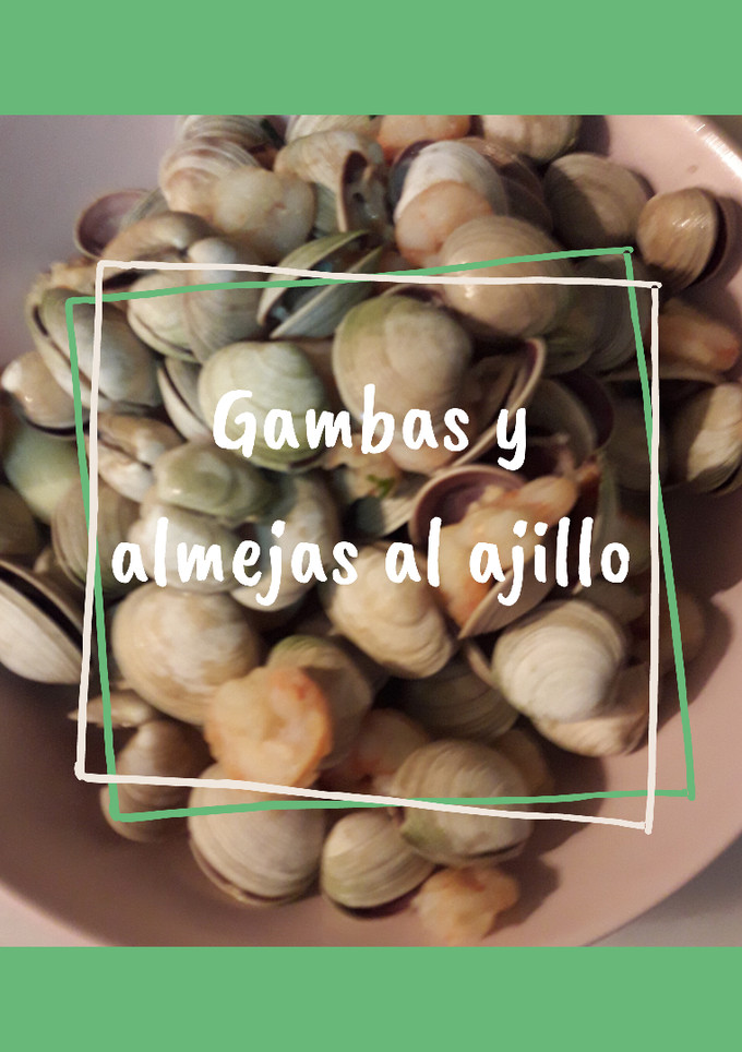 Una foto de Gambas y almejas al ajillo 🦐