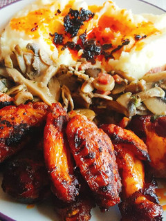 Una foto de Alitas de pollo muy jugosas