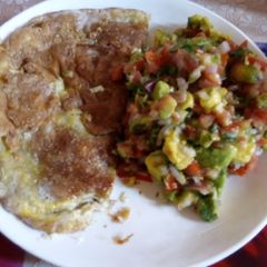 A picture of A recipe of fried egg with kachumbari.
