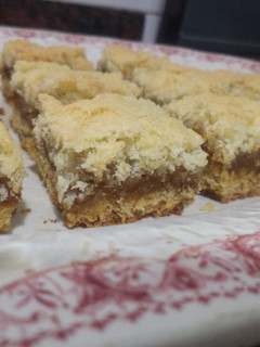 Una foto de Cuadrados de dulce de leche y coco