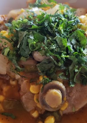 Una foto de Chuletas con champiñones