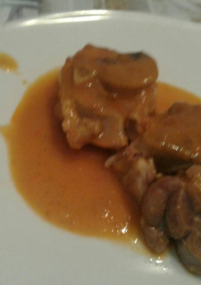 Una foto de Ossobuco con salsa de mandarina