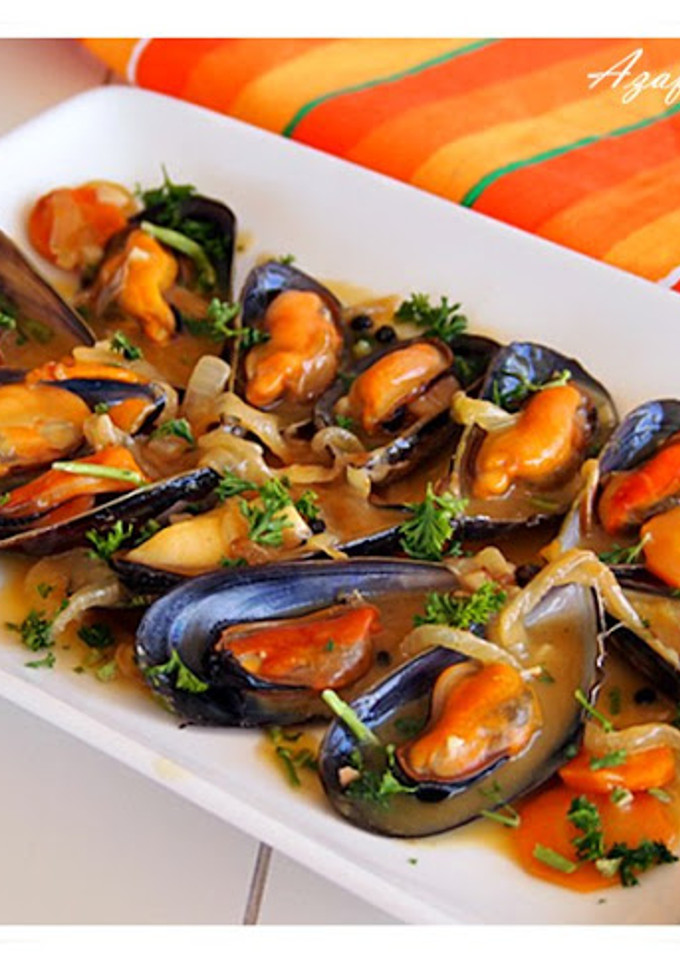 Una foto de Mejillones con salsa de vino