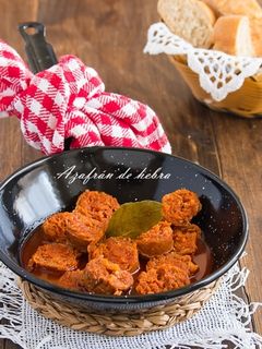 Una foto de Chorizos al vino blanco