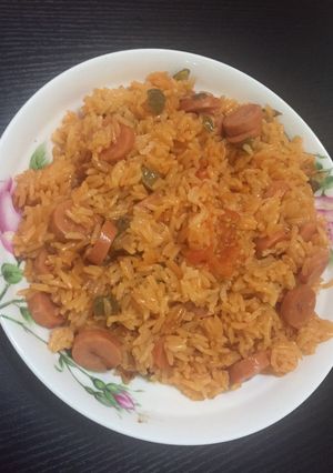 Una foto de Arroz con salchichas
