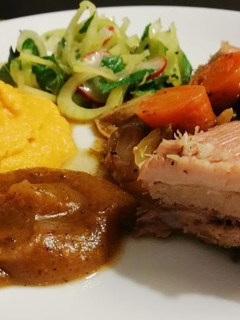 A picture of Roasted Pork Belly with Ras el Hanout Apple Sauce and Fennel and Mint Salad.