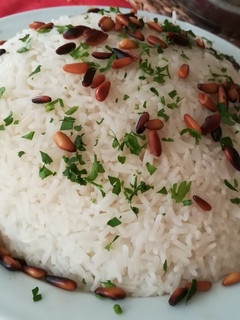 Una foto de Arroz cocido con piñones