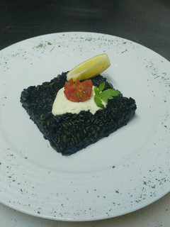Una foto de Arroz Negro
