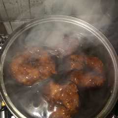 Una foto de Picarones en salsa de chancaca