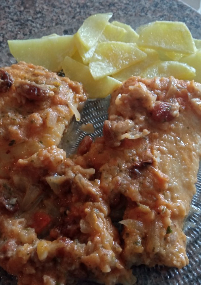 Una foto de Bacallà amb panses i pinyons