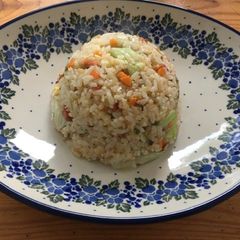 A picture of Fried Rice with Leftover vegetables.