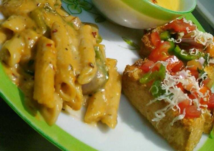 An Italian plater.pasta, bruschetta and almond broccoli soup