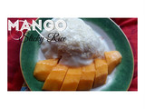 Mango sticky rice with sesame seeds