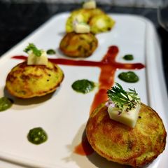 A picture of Cheesy Semolina Appam.