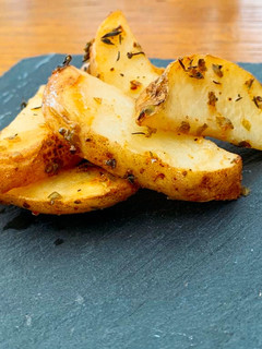 Una foto de Patatas especiadas al horno