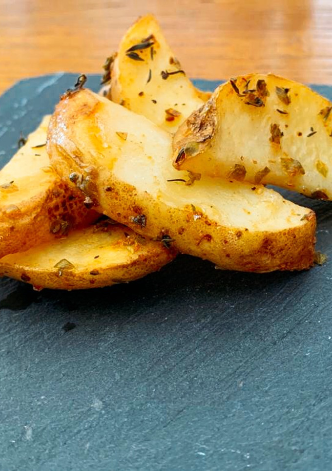 Una foto de Patatas especiadas al horno