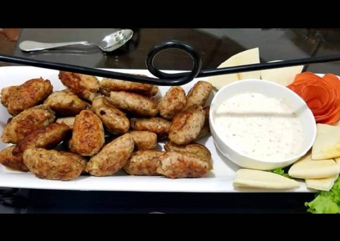 Step-by-Step Guide to Make Homemade Kebabs with onion salad and spicy
cream cheese sauce