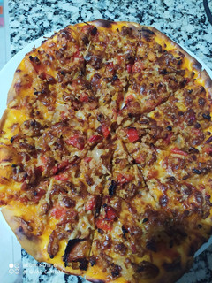Una foto de Pizza de carne