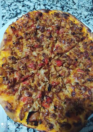 Una foto de Pizza de carne