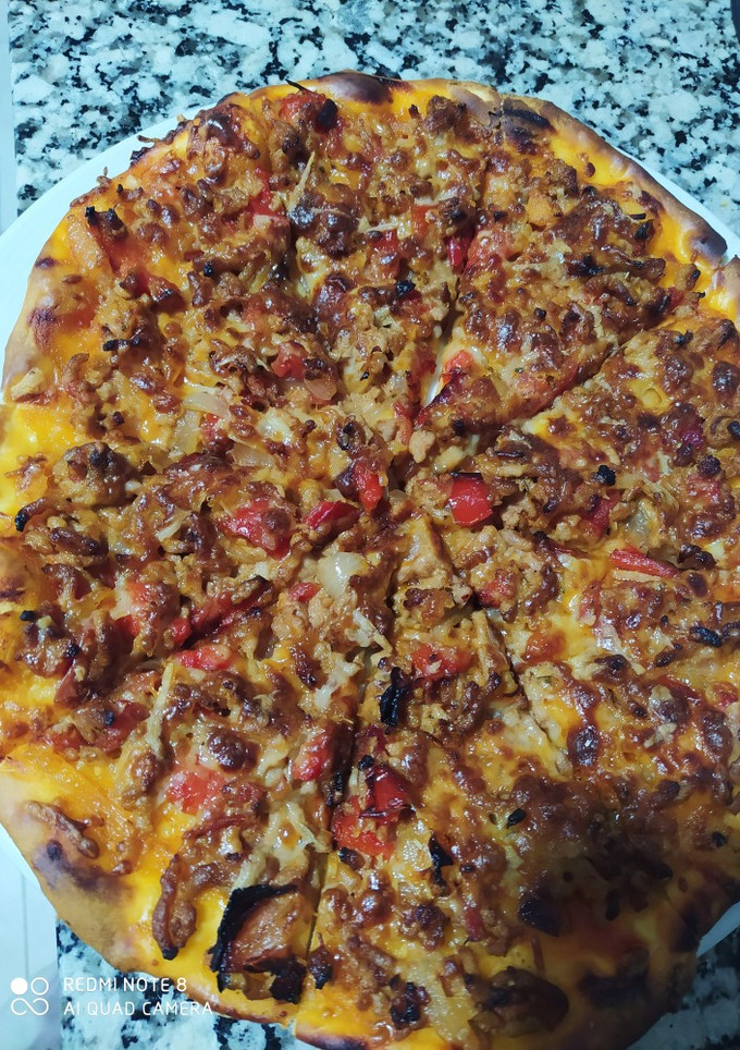 Una foto de Pizza de carne