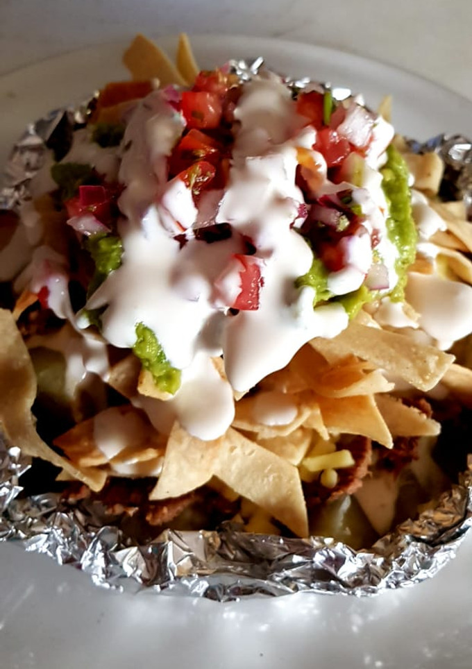 Una foto de Papas a la Maya