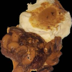 A picture of Salisbury Steak with Mushroom Marsala Sauce.