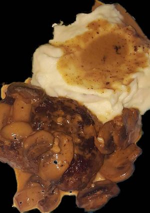 A picture of Salisbury Steak with Mushroom Marsala Sauce.