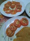 Tomate con curry, oliva y vinagre de vino torrontes