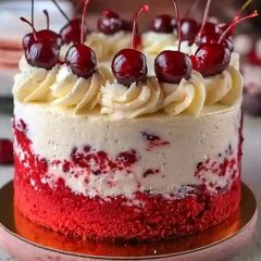 A picture of Cherry Cake with Cherry Cream Cheese Frosting.
