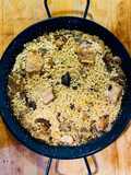 Arroz seco con setas y costillas