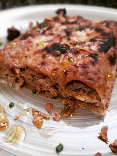 Una foto de Canelones de carne asada con bechamel de ciruelas pasas