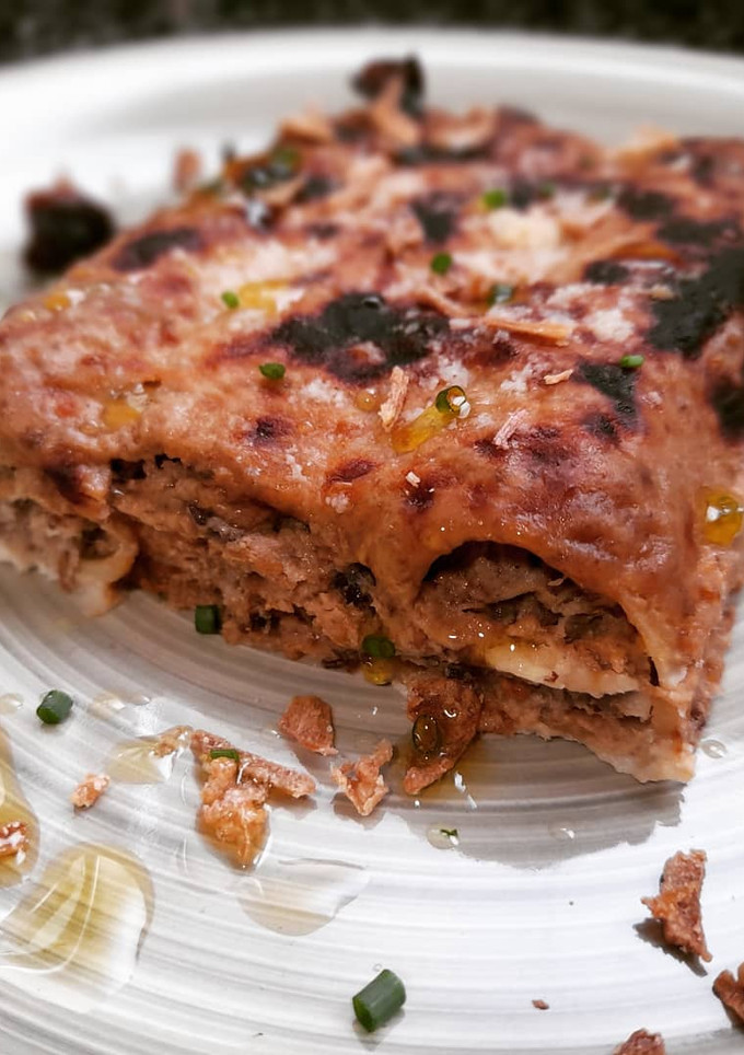 Una foto de Canelones de carne asada con bechamel de ciruelas pasas