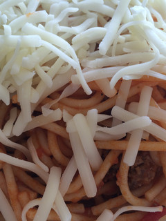 Una foto de Spaguettis boloñesa con queso
