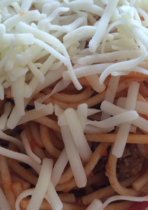 Una foto de Spaguettis boloñesa con queso