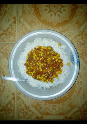 A picture of Rice with sweetcorn stew.