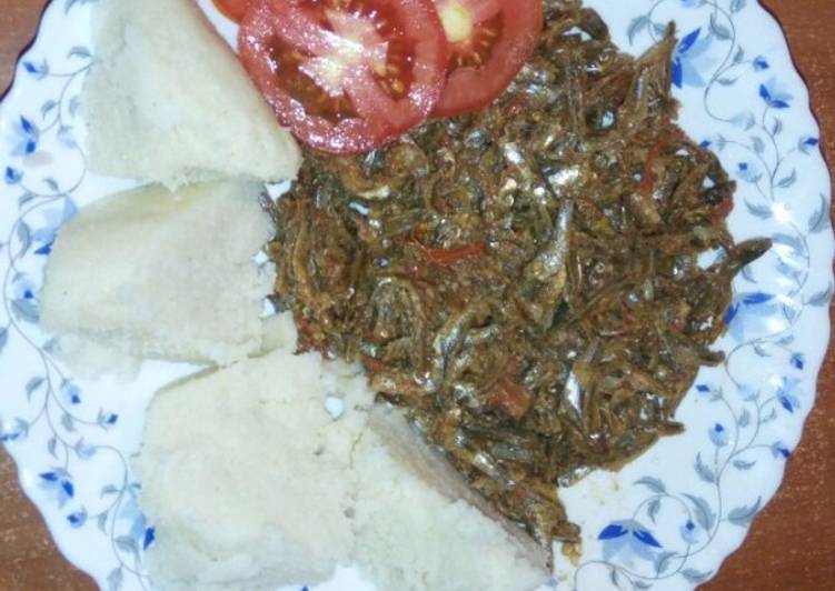 Ugali served with Omena and garnished with tomato