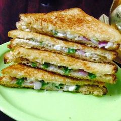 A picture of Grilled Cheesy vegetable sandwich.