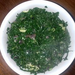 A picture of Onion Sukuma Wiki #throwbackthursdaythree.