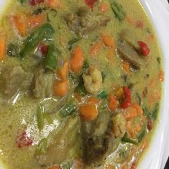 A picture of Chicken coconut sauce.