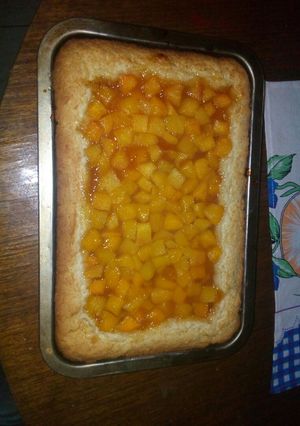 Una foto de Kuchen de durazno