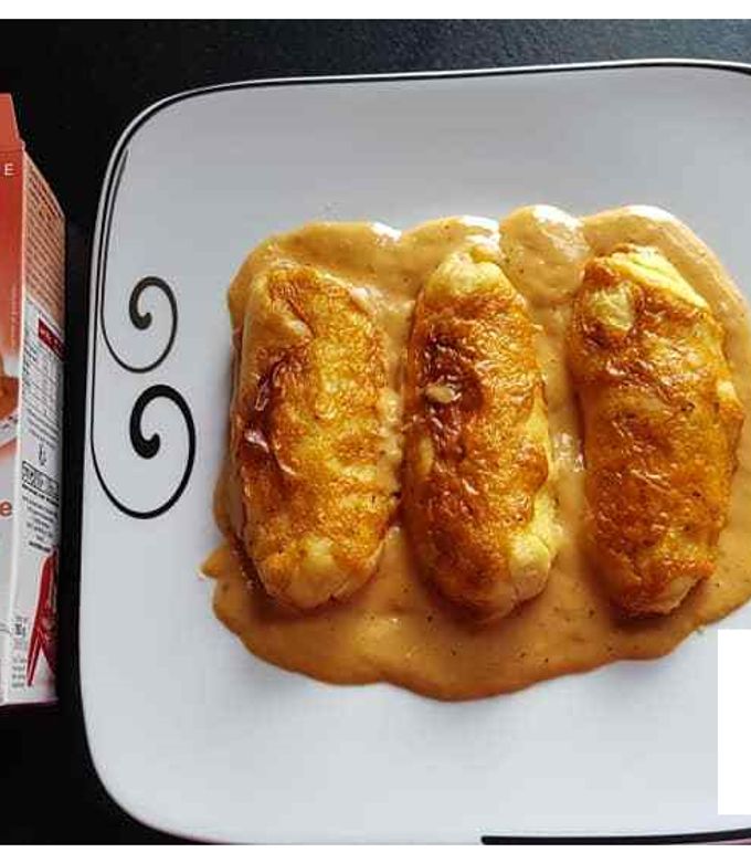 Une photo de Quenelles semoule sauce homardine